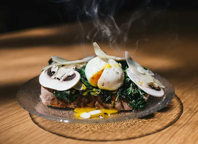 a plate of food with mushrooms